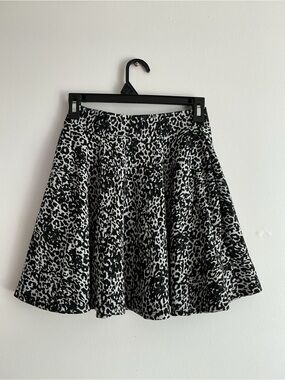 Francesca's Collections Black and White Leopard Skater Skirt